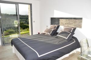 Villas Magnifique villa avec piscine chauffee, vue mer et montage : photos des chambres