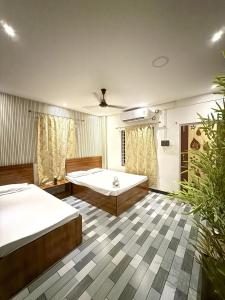 Tulip Inn - 3BHK-G AC Near Kamakhya