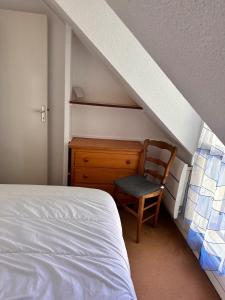 Maisons de vacances Ty Foc - Maisonnette en bord de mer - Jardin & Tennis : photos des chambres