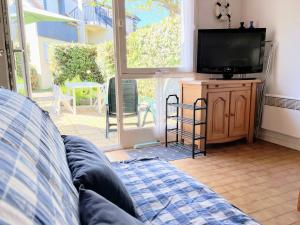 Maisons de vacances Ty Foc - Maisonnette en bord de mer - Jardin & Tennis : photos des chambres
