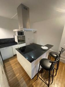 Appartements Duplex Hyper centre cosy : photos des chambres