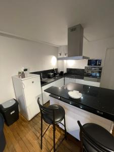 Appartements Duplex Hyper centre cosy : photos des chambres