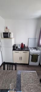 Appartements Maison avec jardin et garage : photos des chambres