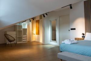 APARTAMENTOS SARMIENTO - ÁTICO