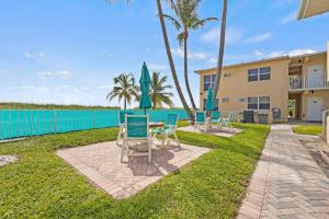 Beachfront with views, grill, pool & parking