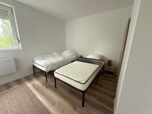 CarlAppartement Elegance et Confort avec Wi-Fi & Parking II