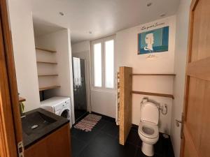 Appartements Appartement chaleureux : photos des chambres