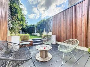 Maisons de vacances Maison de ville avec Jardin : photos des chambres