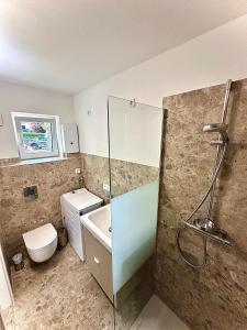Stylisches See-Studio mit Badezugang & Garten