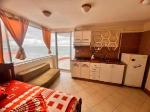 Arena y Mar Arco Iris