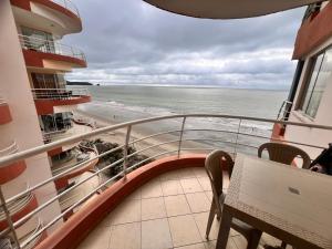 Arena y Mar Arco Iris