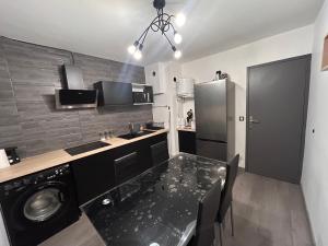 Appartements Le Reflet Gris : photos des chambres