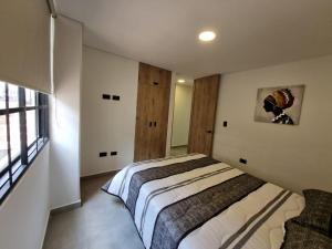 Apartment with a hot tub and a view of Guatapé lake