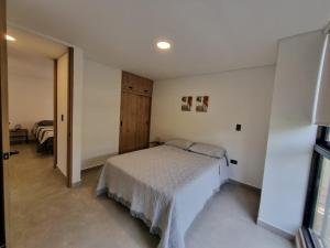 Apartment with a hot tub and a view of Guatapé lake