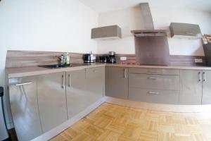 Appartements Tres grand appartement coeur de ville - 7 personnes : photos des chambres