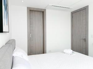 Suites de lujo cerca del WORLD TRADE CENTER, Parking Gratis, GYM, PISCINA