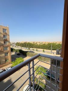 The apartment overlooks a main street view