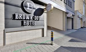 Brown Dot Hotel Minam