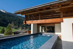 Chalets La Clusaz chalet Anthocyane 14 people, heated pool : photos des chambres
