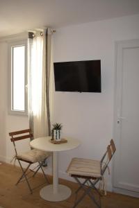 Appartements Escapade Ibiza Balneo & Terrasse : photos des chambres