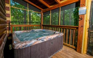 Chalet room in At Last Shagbark Cabin with Hot Tub Arcade Games and More