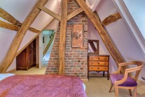 Maisons de vacances La maison du fermier : photos des chambres
