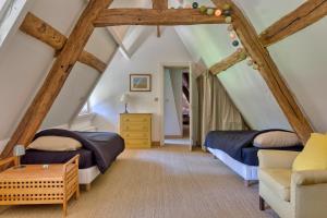 Maisons de vacances La maison du fermier : photos des chambres