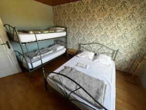 Maisons de vacances Jolie maison avec piscine : photos des chambres