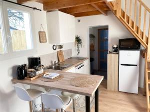 Maisons de vacances Tiny house proche de la Plage : photos des chambres