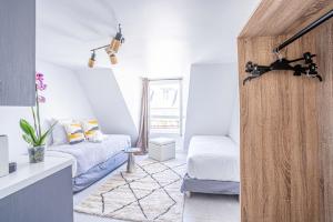 Studio 05 - Paris Faubourg Bail Mobilité - 4-Sterne-Hotels in Paris