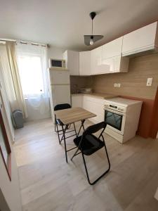 Appartements Le petit Lignon, Centre ville : photos des chambres