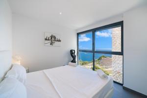 Appartements Duplex - Terrasse vue mer & Jacuzzi - Parking - DU : photos des chambres