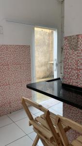 Casa ao lado da rodoviária com ar condicionado