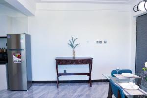 spacious elegant apartment with swimming pool, private parking space, child play area and unbeatable city views