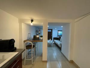 Appartements Appartement cosy avec terrasse jardin : photos des chambres
