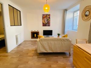 Appartements CHEZ MARiUS : photos des chambres