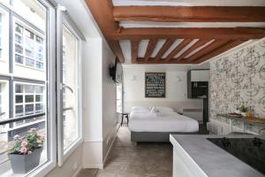 Studio parisien 20m2 en face du musee Grevin - 2P