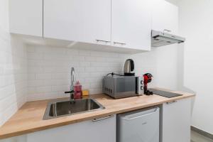 Appartements Studio elegant sacre coeur metro anvers - Paris 18 -2P : photos des chambres