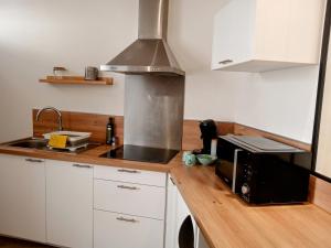 Appartements Les studios de la gare linge cafe the inclus wifi : photos des chambres