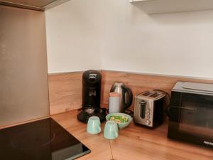 Appartements Les studios de la gare linge cafe the inclus wifi : photos des chambres