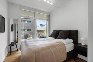 Heart of Aarhus, modern apartment and paid parking nearby