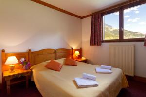 Villages vacances Hotel Club mmv Le Val Cenis *** : Chambre Quadruple