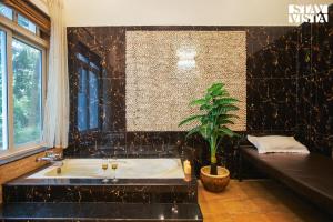 StayVista at Azure Bliss with Huge Pool, BBQ, Wi-Fi