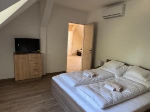 Sziget Apartmanház