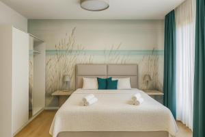 Exklusive Rückzugsorte direkt am türkisblauen See