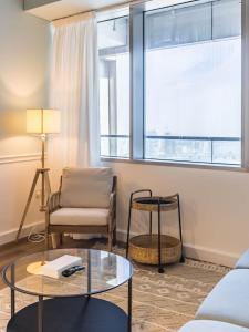 Stylish 1-Bedroom with Panoramic Partial Sea View