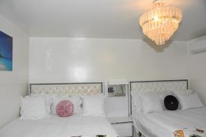 Sejours chez l'habitant Villa confort - Hebergement Touristique Grand PARIS : photos des chambres