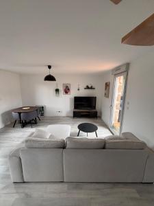 Appartements lesjolislogementsbrivistes Lelegant : photos des chambres