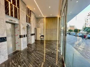 Bright Corniche Escape - 2 BR Urban Flat