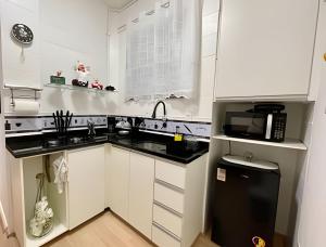 Lindo Loft, frente ao Metrô, a 5 minutos do Aterro em 6x sem juros